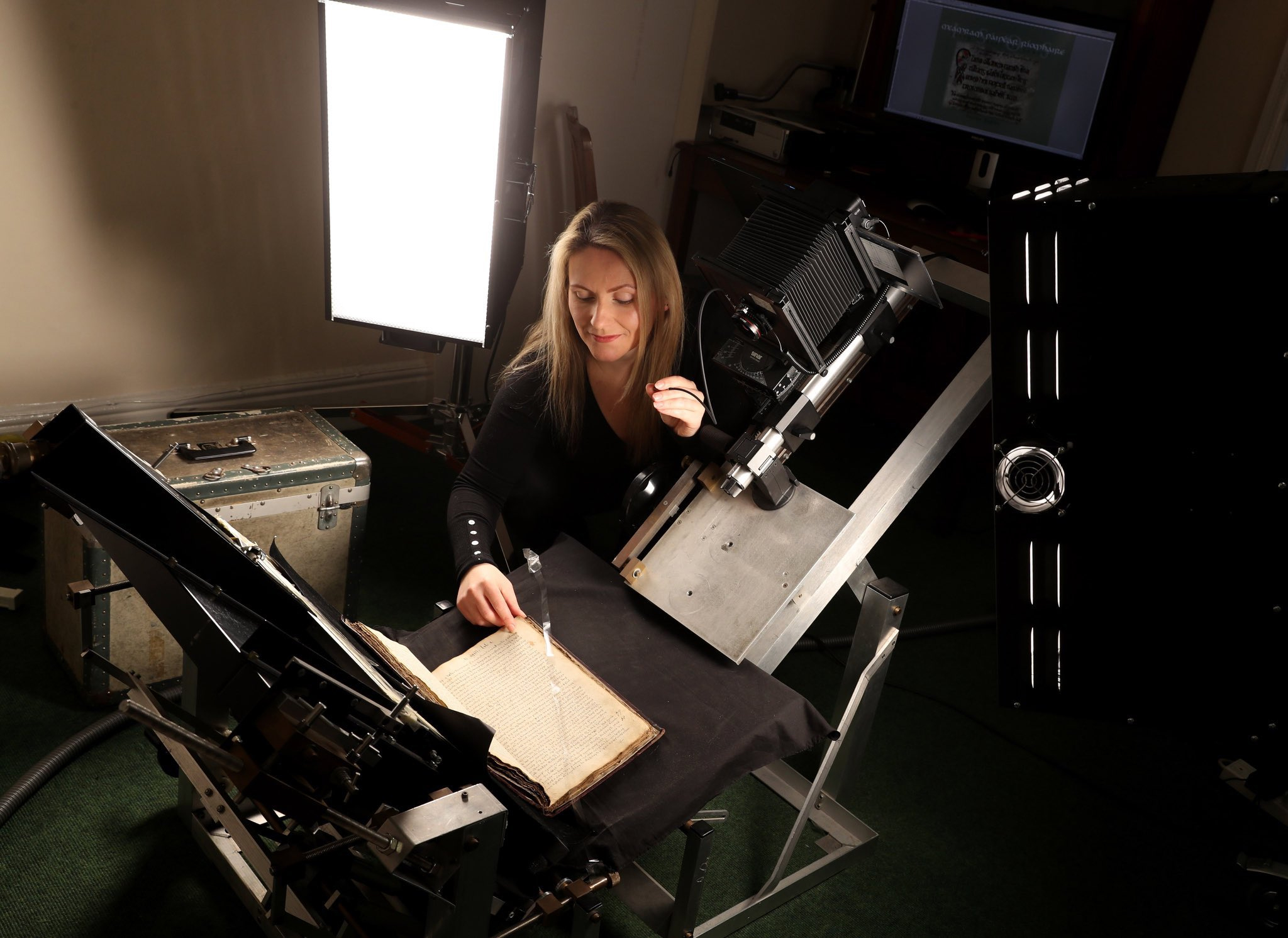 Image showing manuscript on cradle with lights and camera